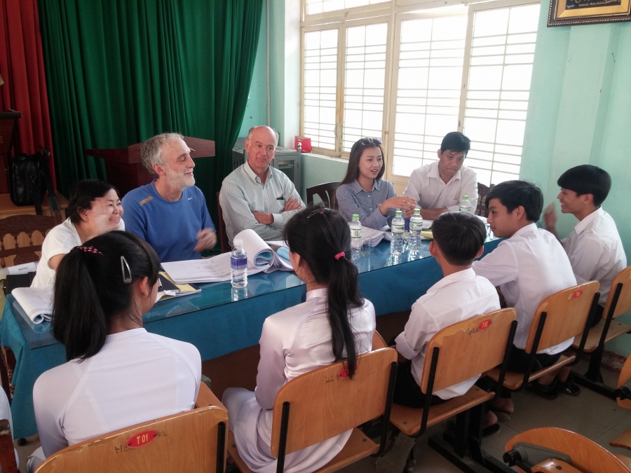 people talking at a table 